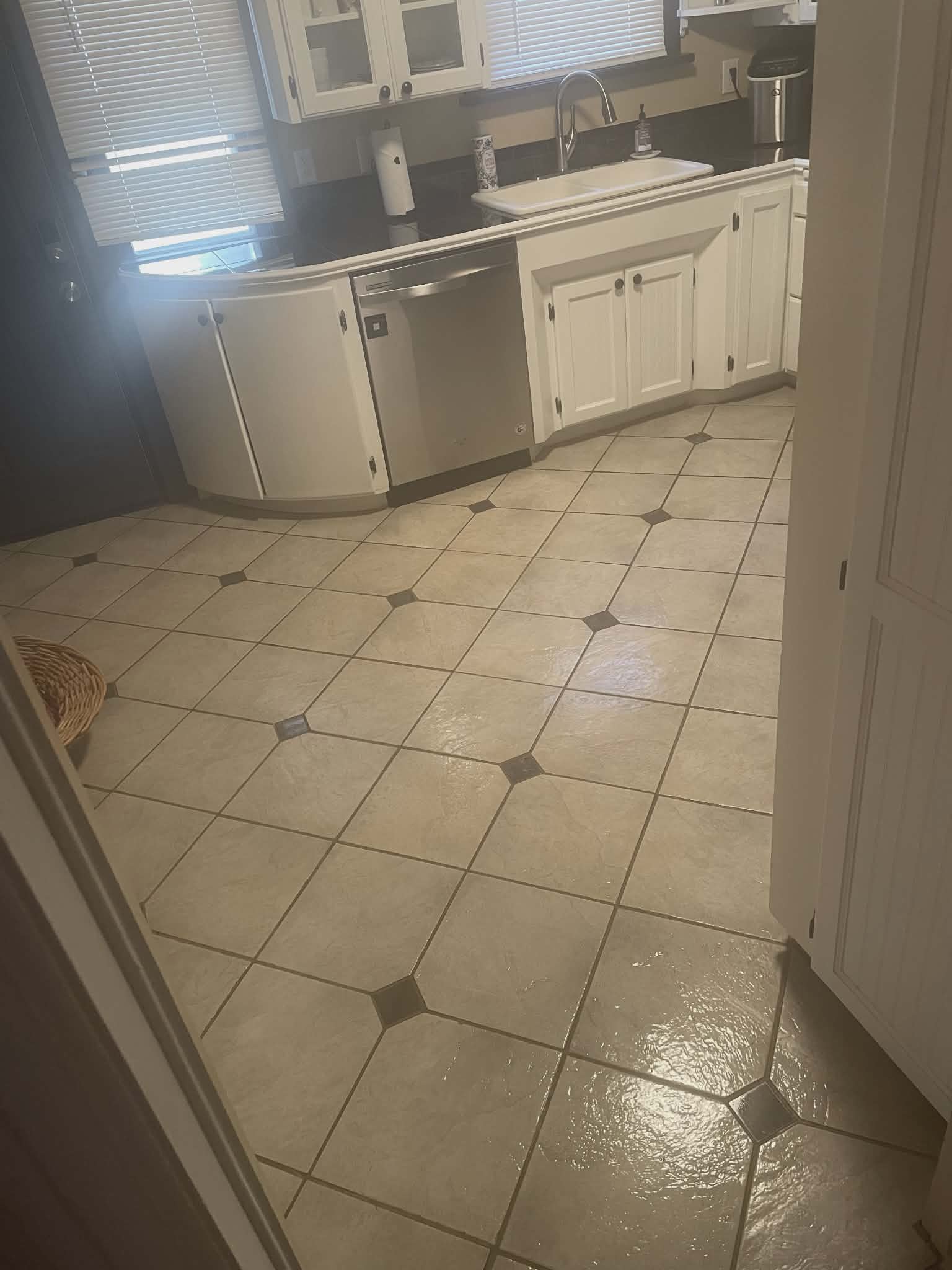 Sparkling clean kitchen with shiny tile floors